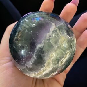 Aqua coloured agate crystal sphere.
